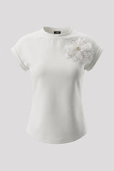 Camiseta mujer con aplique de flor