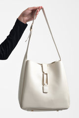 Set de tres bolsos metálico
