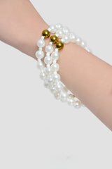 Set pulseras con perlas color blanco